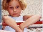 La photographe enfant dans une aire de jeux
