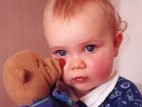 Photo de la photographe bébé avec son doudou